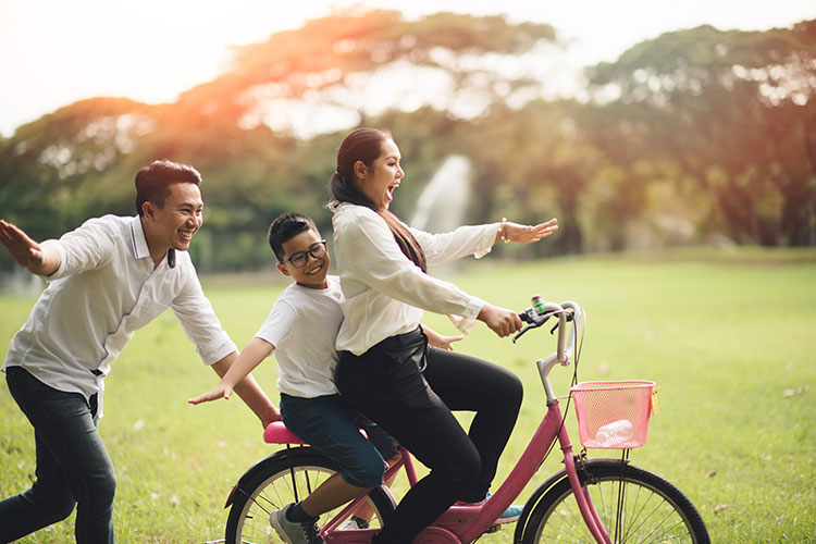 family going out for a bike ride in nature